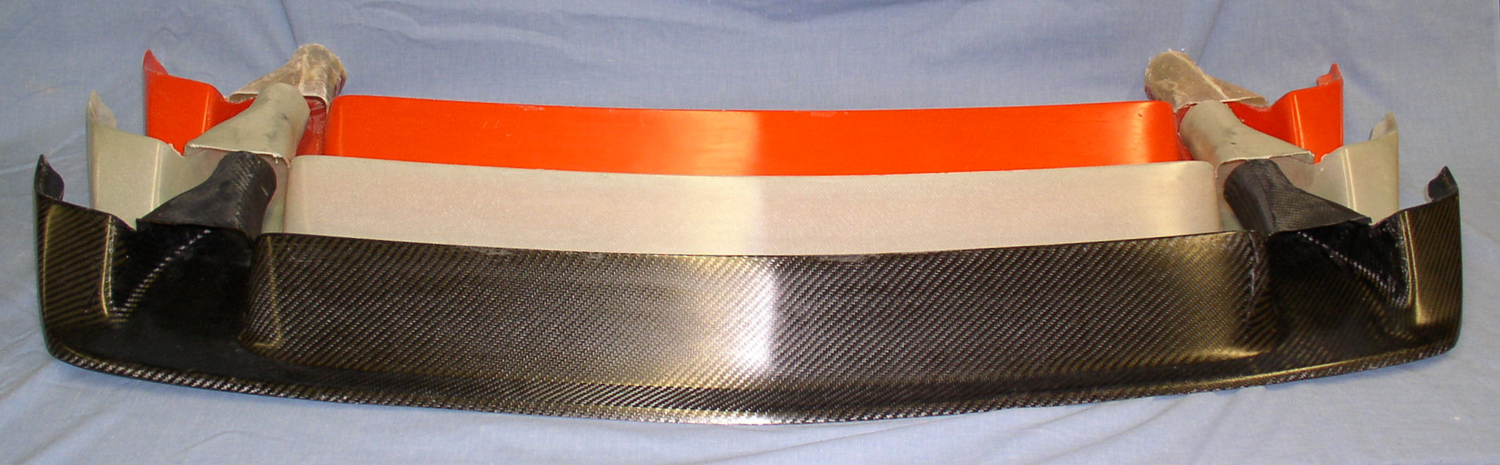 FutoFab Datsun 510 Spooks in all three different construction types, CF/Epoxy (front), FG/Epoxy (center) and Orange Line (rear)